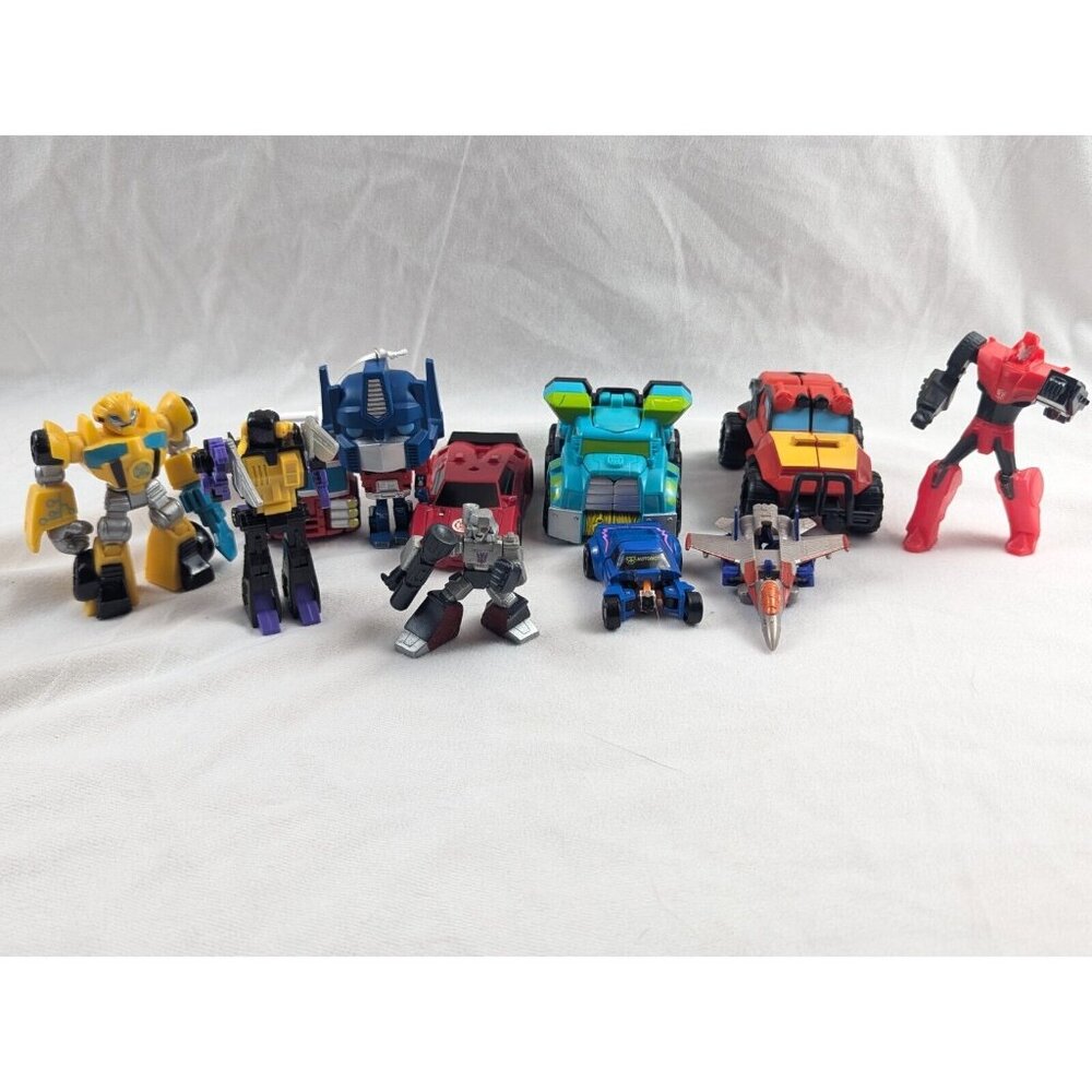 Transformers Tomy/Hasbro lot of 11 action figures. Excellent pre-owned quality